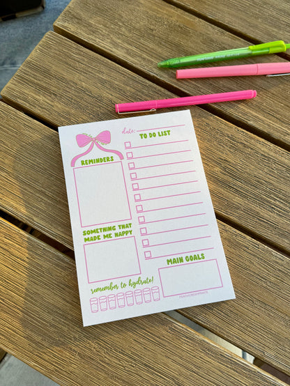 OOPSIE BOW DAILY PLANNER NOTEPAD