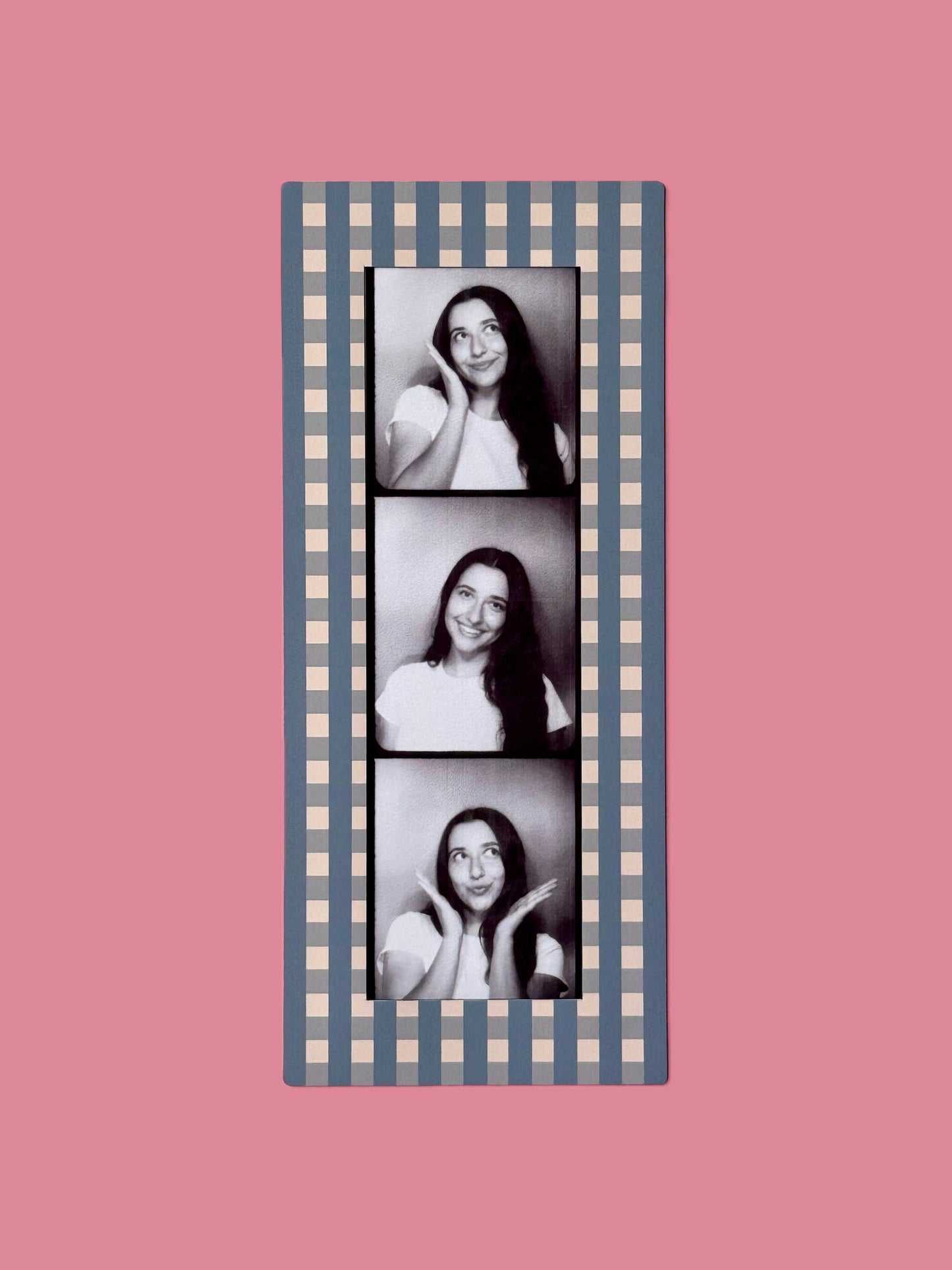 Checkered photo frame with three black and white photos of a woman on a pink background